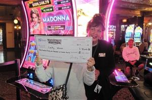 Madonna slot winning holding jackpot check