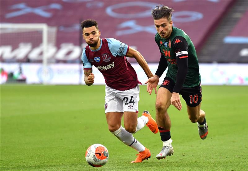 LONDON, ENGLAND - JULY 26: Ryan Fredericks of West Ham United and Jack Grealish of Aston Villa during the Premier League match between West Ham United and Aston Villa at London Stadium on July 26, 2020 in London, England. (Photo by Justin Setterfield/Getty Images)