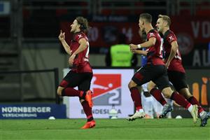 NUREMBERG, GERMANY - OCTOBER 05: Felix Lohkemper (L) of Nürnberg celebrates scoring the 2nd team goal during the Second Bundesliga match between 1. FC Nürnberg and SV Darmstadt 98 at Max-Morlock-Stadion on October 05, 2020 in Nuremberg, Germany. (Photo by Alexander Hassenstein/Getty Images)