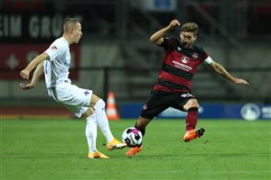 NUREMBERG, GERMANY - OCTOBER 05: Enrico Valentini (R) of Nürnberg battles for the ball with Tim Skaka of Darmstadt during the Second Bundesliga match between 1. FC Nürnberg and SV Darmstadt 98 at Max-Morlock-Stadion on October 05, 2020 in Nuremberg, Germany. (Photo by Alexander Hassenstein/Getty Images)