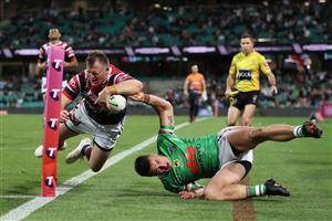 SYDNEY, AUSTRALIA - OCTOBER 09: Josh Morris of the Roosters is tackled by Charnze Nicoll-Klokstad of the Raiders during the NRL Semi Final match between the Sydney Roosters and the Canberra Raiders at the Sydney Cricket Ground on October 09, 2020 in Sydney, Australia. (Photo by Cameron Spencer/Getty Images)
