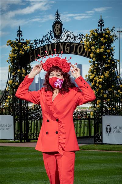 MELBOURNE, AUSTRALIA - OCTOBER 27: Kim Fletcher – Myer milliner poses for a photo during the Melbourne Cup Carnival launch at Flemington Racecourse on October 27, 2020 in Melbourne, Australia. (Photo by Darrian Traynor/Getty Images)