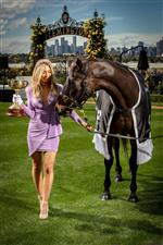 MELBOURNE, AUSTRALIA - OCTOBER 27: Melbourne Cup Carnival Ambassador Nadia Bartel poses with the Melbourne Cup and 2000 Melbourne Cup Winner 'Brew' at the Melbourne Cup Carnival launch at Flemington Racecourse on October 27, 2020 in Melbourne, Australia. (Photo by Darrian Traynor/Getty Images)
