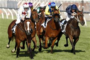 MELBOURNE, AUSTRALIA - NOVEMBER 05: William Pike on board Written Beauty wins race 9 the Network 10 Red Roses Stakes during 2020 Kennedy Oaks Day at Flemington Racecourse on November 05, 2020 in Melbourne, Australia. (Photo by Darrian Traynor/Getty Images for the VRC)