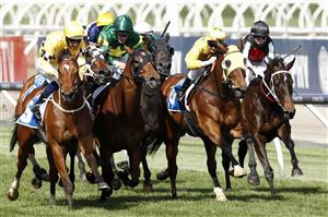 MELBOURNE, AUSTRALIA - NOVEMBER 05: Hugh Bowman (L) on board Rocha Clock wins race 6 Inglis Bracelet during 2020 Kennedy Oaks Day at Flemington Racecourse on November 05, 2020 in Melbourne, Australia. (Photo by Darrian Traynor/Getty Images for the VRC)