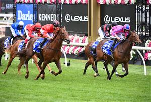 MELBOURNE, AUSTRALIA - NOVEMBER 05: Jockey Jordan Childs riding Dosh to victory in Race 2, the Darley Ottawa Stakes, during 2020 Kennedy Oaks Day at Flemington Racecourse on November 05, 2020 in Melbourne, Australia. (Photo by Vince Caligiuri/Getty Images for the VRC)