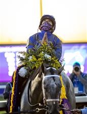 LEXINGTON, KY - NOVEMBER 07: Luis Saez, riding Essential Quality, celebrates after winning the Breeders Cup Juvenile race for two year old colts and geldings at Keenland on November 6, 2020 in Lexington, Kentucky. (Photo by Bobby Ellis/Getty Images)