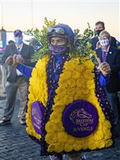 LEXINGTON, KY - NOVEMBER 07: Luis Saez, riding Essential Quality, celebrates after winning the Breeders Cup Juvenile race for two year old colts and geldings at Keenland on November 6, 2020 in Lexington, Kentucky. (Photo by Bobby Ellis/Getty Images)