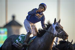 LEXINGTON, KY - NOVEMBER 07: Louis Saez, riding Essential Quality, celebrates after winning the Breeders Cup Juvenile at Keenland on November 6, 2020 in Lexington, Kentucky. (Photo by Bobby Ellis/Getty Images)