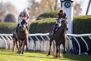 LEXINGTON, KY - NOVEMBER 07: Iran Ortiz, Jr., riding Golden Pal, looks back at Cowan, ridden by Ricardo Santana, Jr., after crossing the finish line to win the Juvenile Turf Sprint during the first day of the Breeders Cup at Keenland on November 6, 2020 in Lexington, Kentucky. (Photo by Bobby Ellis/Getty Images)