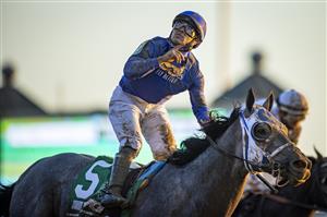 LEXINGTON, KY - NOVEMBER 07: Louis Saez, riding Essential Quality, celebrates after winning the Breeders Cup Juvenile at Keenland on November 6, 2020 in Lexington, Kentucky. (Photo by Bobby Ellis/Getty Images)