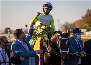 LEXINGTON, KY - NOVEMBER 07: Florent Giroux celebrates after winning the Juvenile Fillies Turf race while riding Aunt Pearl during the Breeders Cup at Keenland on November 6, 2020 in Lexington, Kentucky. (Photo by Bobby Ellis/Getty Images)