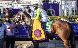 LEXINGTON, KY - NOVEMBER 07: Florent Giroux celebrates in the winners circle after winning the Juvenile Fillies Turf race while riding Aunt Pearl during the Breeders Cup at Keenland on November 6, 2020 in Lexington, Kentucky. (Photo by Bobby Ellis/Getty Images)