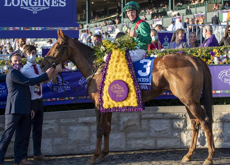 LEXINGTON, KY - NOVEMBER 07: Christophe Soumillon celebrates after winning the Breeders Cup Turf on Tarnawa at Keenland on November 7, 2020 in Lexington, Kentucky. (Photo by Bobby Ellis/Getty Images)