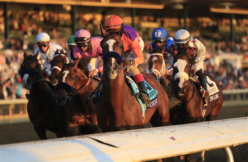LEXINGTON, KENTUCKY - NOVEMBER 07:   Authentic with John Velazquez aboard leads the pack past the finish line on the first lap on the way to victory in the Breeders' Cup Classic during 2020 Breeders' Cup at Keeneland on November 07, 2020 in Lexington, Kentucky. (Photo by Andy Lyons/Getty Images)