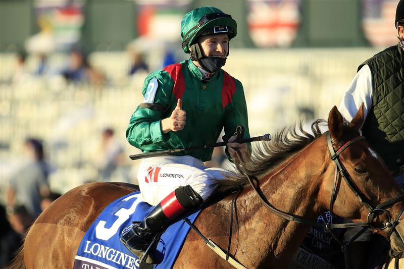 LEXINGTON, KENTUCKY - NOVEMBER 07:   Christophe Soumilion celebrates after riding Tarnawa #3 to victory in the Breeders' Cup Turf during 2020 Breeders' Cup at Keeneland on November 07, 2020 in Lexington, Kentucky. (Photo by Andy Lyons/Getty Images)