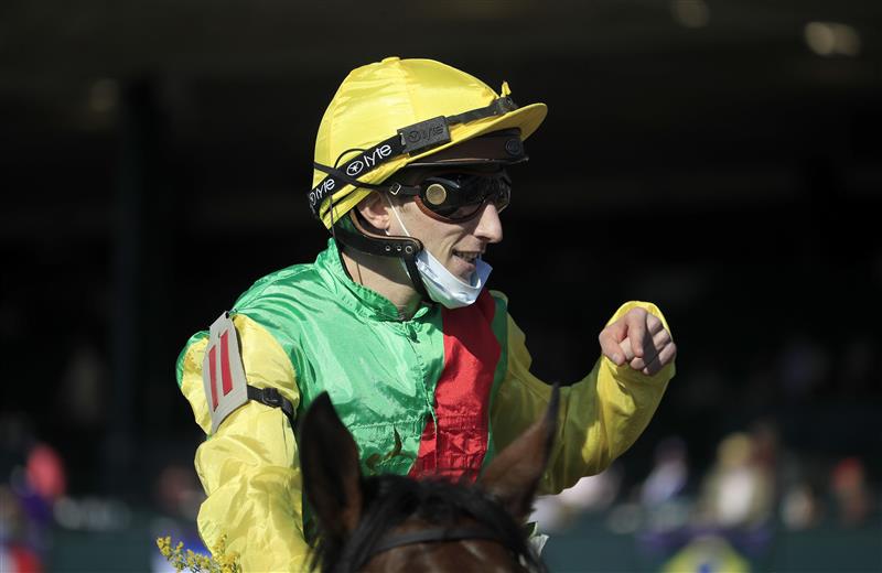 LEXINGTON, KENTUCKY - NOVEMBER 07:   Pierre-Charles Boudot celebrates after riding Audarya to victory in the Breeders,'Cup Filly and Mare Turf during 2020 Breeders' Cup at Keeneland on November 07, 2020 in Lexington, Kentucky. (Photo by Andy Lyons/Getty Images)