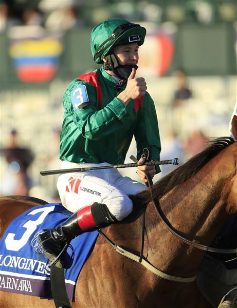 LEXINGTON, KENTUCKY - NOVEMBER 07:   Christophe Soumilion celebrates after riding Tarnawa #3 to victory in the Breeders' Cup Turf during 2020 Breeders' Cup at Keeneland on November 07, 2020 in Lexington, Kentucky. (Photo by Andy Lyons/Getty Images)