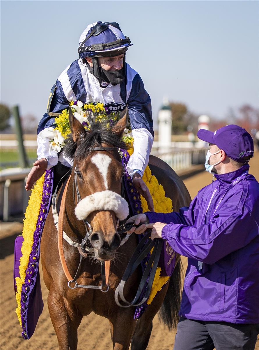 LEXINGTON, KY - NOVEMBER 07: Tom Eaves, riding Glass Slippers, celebrates after winning the Turf Sprint on the second day of the Breeders Cup Championships at Keenland on November 6, 2020 in Lexington, Kentucky. (Photo by Bobby Ellis/Getty Images)