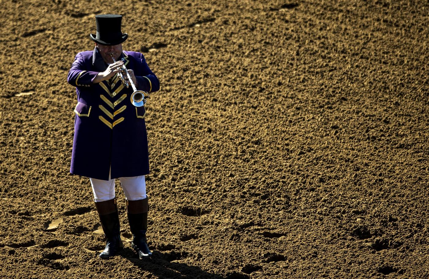 LEXINGTON, KY - NOVEMBER 07: The bugler gives the call for riders to mount their horses during the second day of the Breeders Cup at Keenland on November 7, 2020 in Lexington, Kentucky. (Photo by Bobby Ellis/Getty Images)