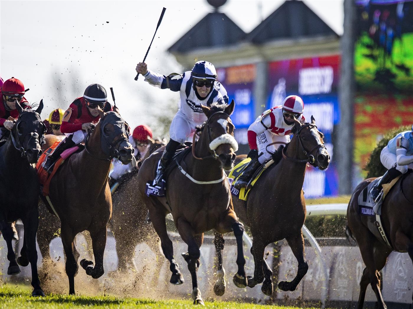 LEXINGTON, KY - NOVEMBER 07: Tom Eaves, riding Glass Slippers, celebrates as he crosses the finish line to win the Turf Sprint on the second day of the Breeders Cup at Keenland on November 6, 2020 in Lexington, Kentucky. (Photo by Bobby Ellis/Getty Images)