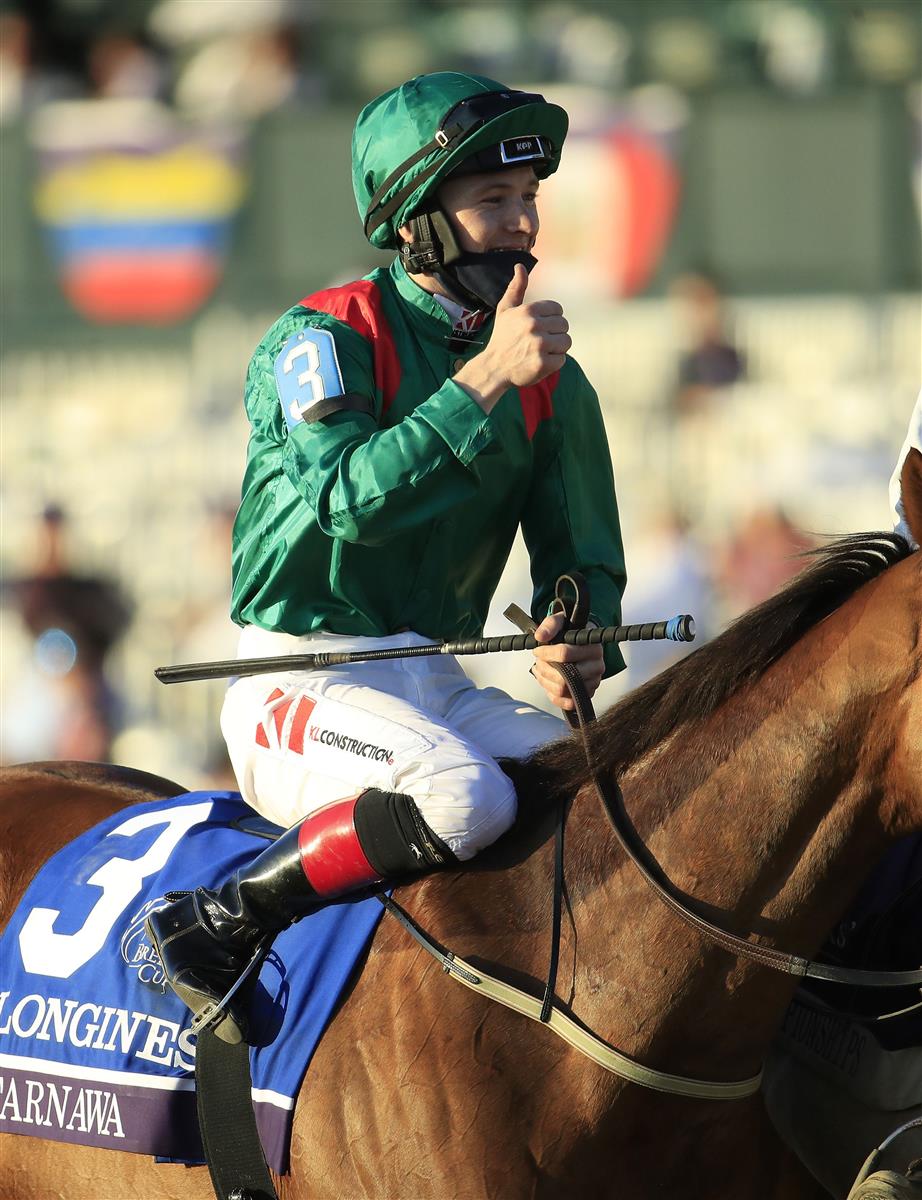 LEXINGTON, KENTUCKY - NOVEMBER 07:   Christophe Soumilion celebrates after riding Tarnawa #3 to victory in the Breeders' Cup Turf during 2020 Breeders' Cup at Keeneland on November 07, 2020 in Lexington, Kentucky. (Photo by Andy Lyons/Getty Images)
