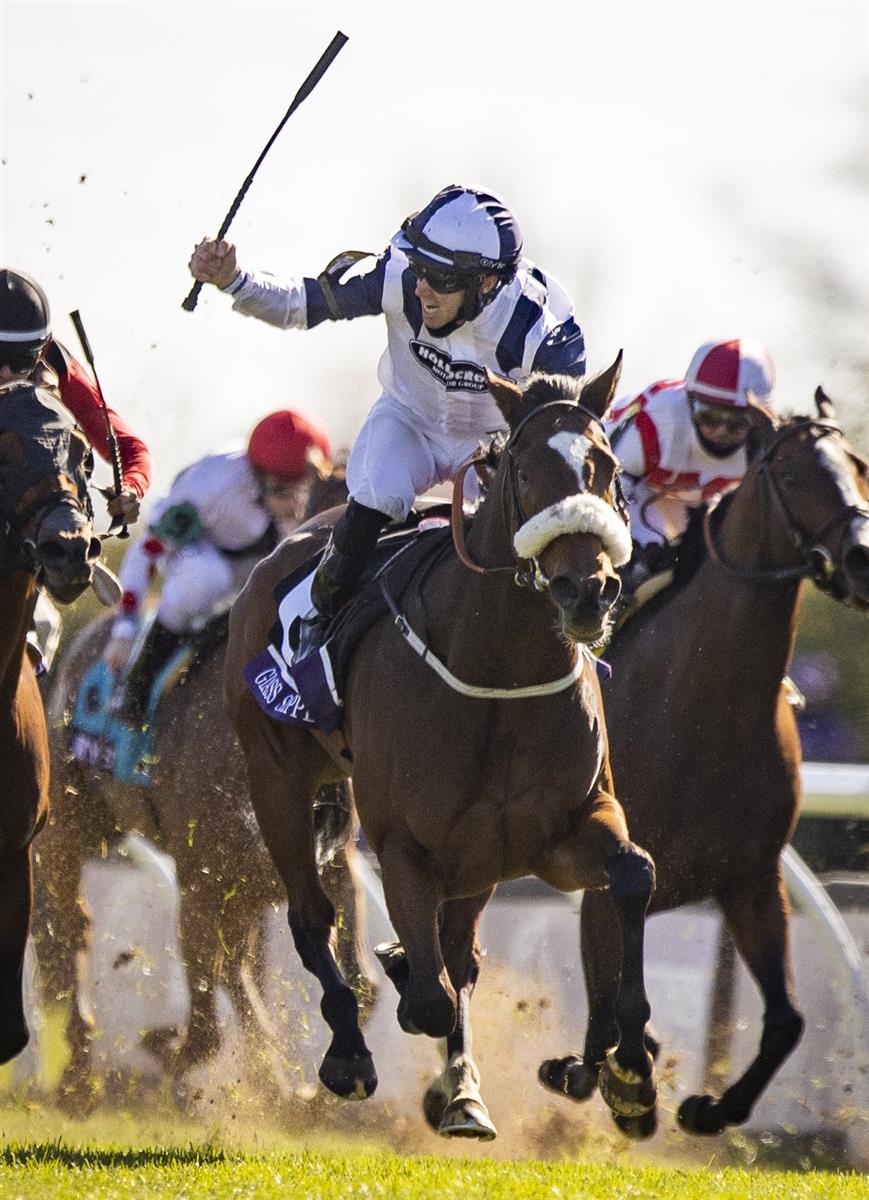 LEXINGTON, KY - NOVEMBER 07: Tom Eaves, riding Glass Slippers, celebrates as he crosses the finish line to win the Turf Sprint on the second day of the Breeders Cup at Keenland on November 6, 2020 in Lexington, Kentucky. (Photo by Bobby Ellis/Getty Images)