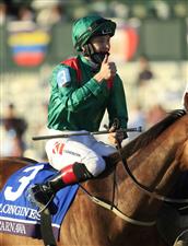 LEXINGTON, KENTUCKY - NOVEMBER 07:   Christophe Soumilion celebrates after riding Tarnawa #3 to victory in the Breeders' Cup Turf during 2020 Breeders' Cup at Keeneland on November 07, 2020 in Lexington, Kentucky. (Photo by Andy Lyons/Getty Images)