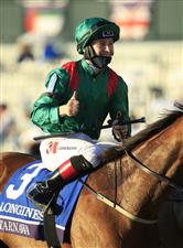 LEXINGTON, KENTUCKY - NOVEMBER 07:   Christophe Soumilion celebrates after riding Tarnawa #3 to victory in the Breeders' Cup Turf during 2020 Breeders' Cup at Keeneland on November 07, 2020 in Lexington, Kentucky. (Photo by Andy Lyons/Getty Images)
