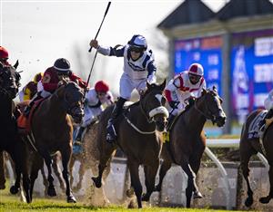LEXINGTON, KY - NOVEMBER 07: Tom Eaves, riding Glass Slippers, celebrates as he crosses the finish line to win the Turf Sprint on the second day of the Breeders Cup at Keenland on November 6, 2020 in Lexington, Kentucky. (Photo by Bobby Ellis/Getty Images)