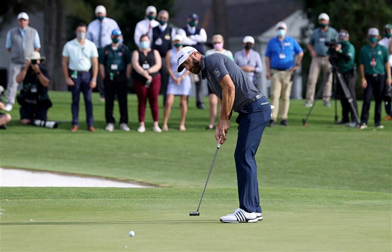 Dustin Johnson putts on the 18th green during the final round of the Masters at Augusta National Golf Club (Photo by Getty Images)