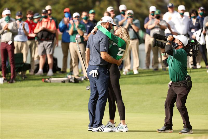 Dustin Johnson kisses fiancée Paulina Gretzky after winning the Masters at Augusta National Golf Club (Photo by Getty Images)