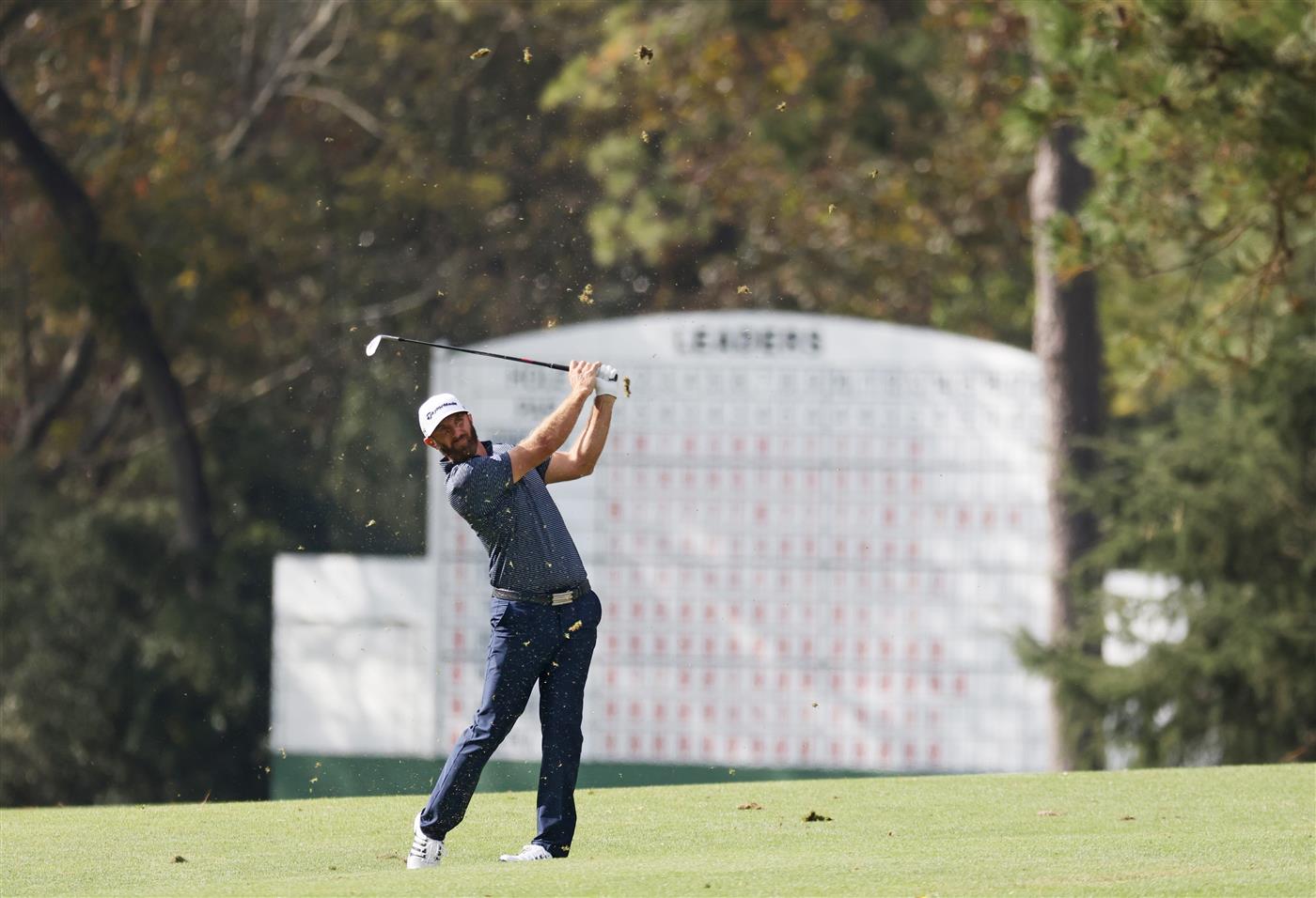 Dustin Johnson plays a shot on the 14th hole during the final round of the Masters at Augusta National Golf Club (Photo by Getty Images)