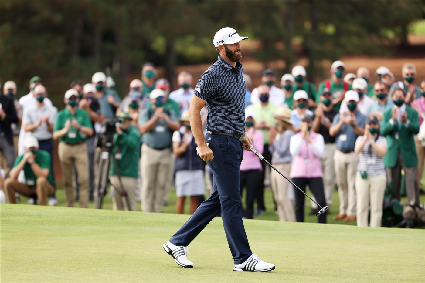 Dustin Johnson reacts on the 18th green after winning the Masters at Augusta National Golf Club (Photo by Getty Images)