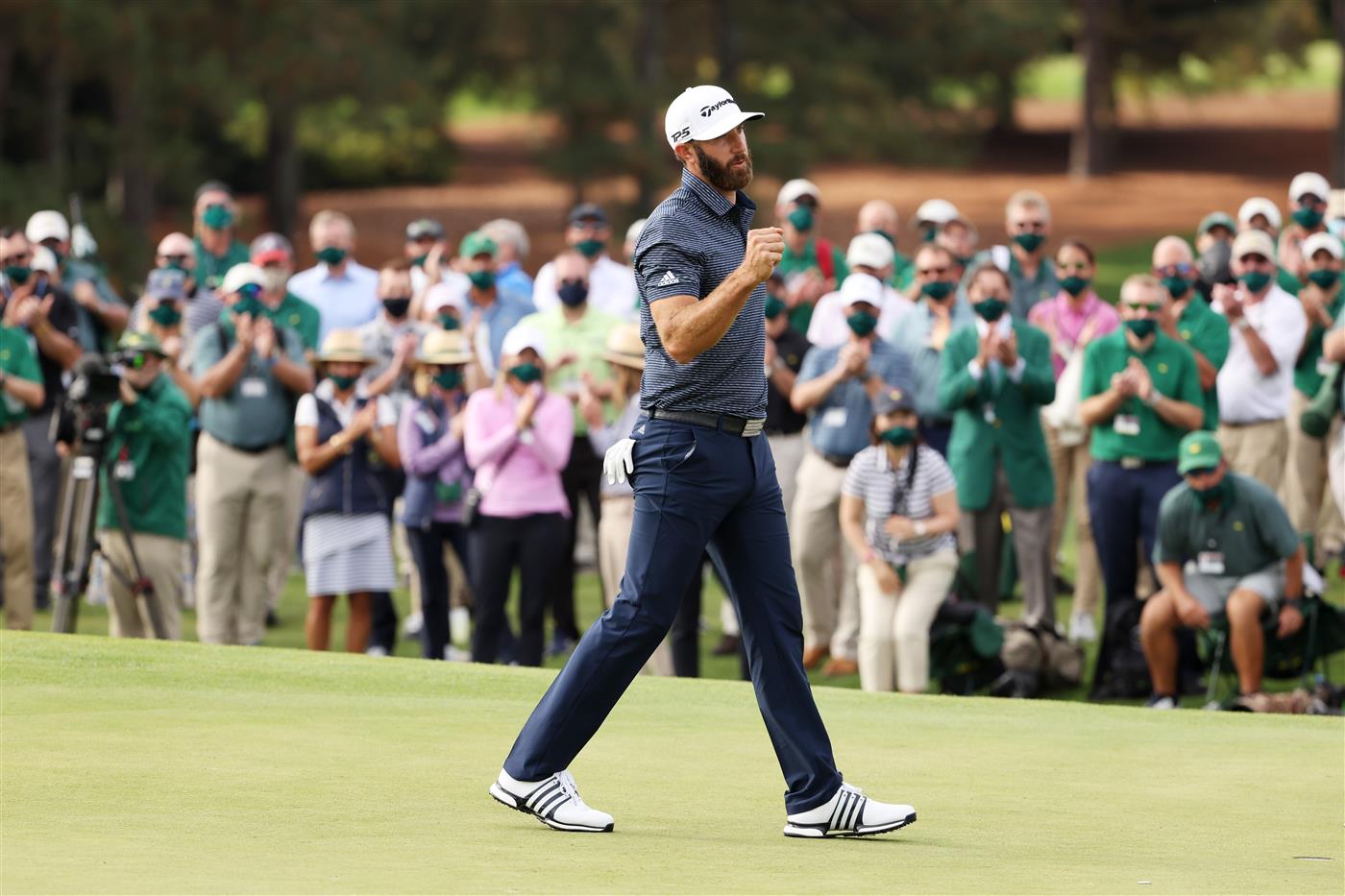 Dustin Johnson reacts on the 18th green after winning the Masters at Augusta National Golf Club (Photo by Getty Images)