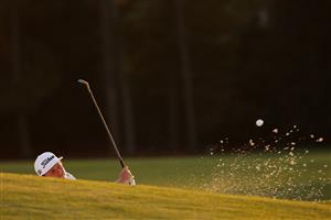 AUGUSTA, GEORGIA - NOVEMBER 14: Cameron Smith of Australia plays a shot from a bunker on the 18th hole during the third round of the Masters at Augusta National Golf Club on November 14, 2020 in Augusta, Georgia. (Photo by Jamie Squire/Getty Images)