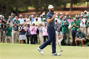Dustin Johnson reacts on the 18th green after winning the Masters at Augusta National Golf Club (Photo by Getty Images)