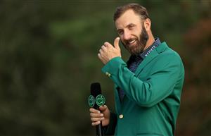 Dustin Johnson reacts as he is interviewed during the Green Jacket Ceremony after winning the Masters at Augusta National Golf Club (Photo by Getty Images)