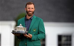 Dustin Johnson of the United States poses with the Masters Trophy during the Green Jacket Ceremony after winning the Masters at Augusta National Golf Club (Photo by Getty Images)