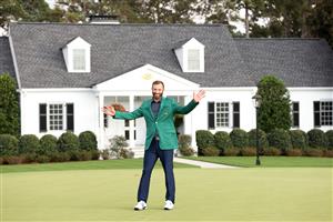 Dustin Johnson of the United States reacts during the Green Jacket Ceremony after winning the Masters at Augusta National Golf Club (Photo by Getty Images)