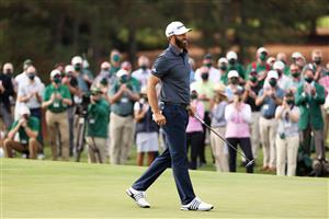 Dustin Johnson reacts on the 18th green after winning the Masters at Augusta National Golf Club (Photo by Getty Images)
