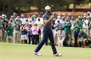 Dustin Johnson reacts on the 18th green after winning the Masters at Augusta National Golf Club (Photo by Getty Images)