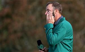 Dustin Johnson reacts as he is interviewed during the Green Jacket Ceremony after winning the Masters at Augusta National Golf Club (Photo by Getty Images)
