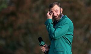Dustin Johnson reacts as he is interviewed during the Green Jacket Ceremony after winning the Masters at Augusta National Golf Club (Photo by Getty Images)