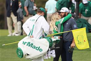 Dustin Johnson kisses fiancée Paulina Gretzky after winning the Masters at Augusta National Golf Club (Photo by Getty Images)