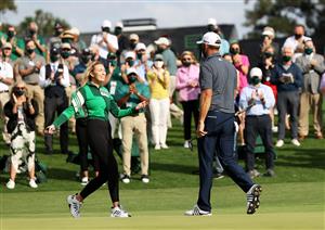 Dustin Johnson kisses fiancée Paulina Gretzky after winning the Masters at Augusta National Golf Club (Photo by Getty Images)