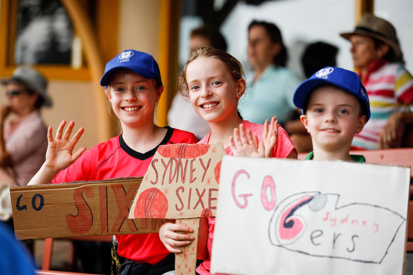 SYDNEY, AUSTRALIA - NOVEMBER 22: Sixers fans cheer on during the Women's Big Bash League WBBL match between the Melbourne Stars and the Sydney Sixers at North Sydney Oval, on November 22, 2020, in Sydney, Australia. (Photo by Hanna Lassen/Getty Images)