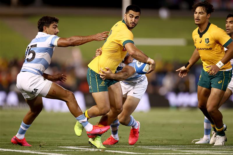 NEWCASTLE, AUSTRALIA - NOVEMBER 21: Tom Wright of Australia is tackled during the 2020 Tri-Nations match between the Australian Wallabies and the Argentina Pumas at McDonald Jones Stadium on November 21, 2020 in Newcastle, Australia. (Photo by Cameron Spencer/Getty Images)