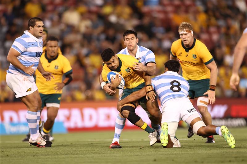 NEWCASTLE, AUSTRALIA - NOVEMBER 21: Hunter Paisami of Australia is tackled during the 2020 Tri-Nations match between the Australian Wallabies and the Argentina Pumas at McDonald Jones Stadium on November 21, 2020 in Newcastle, Australia. (Photo by Cameron Spencer/Getty Images)