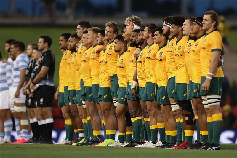 NEWCASTLE, AUSTRALIA - NOVEMBER 21: The Wallabies sing the national anthem before the 2020 Tri-Nations match between the Australian Wallabies and the Argentina Pumas at McDonald Jones Stadium on November 21, 2020 in Newcastle, Australia. (Photo by Mark Metcalfe/Getty Images)